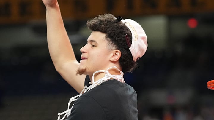 Apr 7, 2025; San Antonio, TX, USA; Florida Gators guard Walter Clayton Jr. (1) cuts down the net after defeating the Houston Cougars in the national championship game of the Final Four of the 2025 NCAA Tournament at the Alamodome. Mandatory Credit: Robert Deutsch-Imagn Images Apr 7, 2025; San Antonio, TX, USA; Florida Gators guard Walter Clayton Jr. (1) cuts down the net after defeating the Houston Cougars in the national championship game of the Final Four of the 2025 NCAA Tournament at the Alamodome. Mandatory Credit: Robert Deutsch-Imagn Images