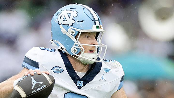 Aug 29, 2026; Dublin, Co. Dublin, IRL; North Carolina Tar Heels quarterback Billy Edwards Jr. (9) runs the ball against TCU Horned Frogs linebacker Paul Oyewale (97) in the first half at Aviva Stadium. Mandatory Credit: Laszlo Geczo-Imagn Images Aug 29, 2026; Dublin, Co. Dublin, IRL; North Carolina Tar Heels quarterback Billy Edwards Jr. (9) runs the ball against TCU Horned Frogs linebacker Paul Oyewale (97) in the first half at Aviva Stadium. Mandatory Credit: Laszlo Geczo-Imagn Images