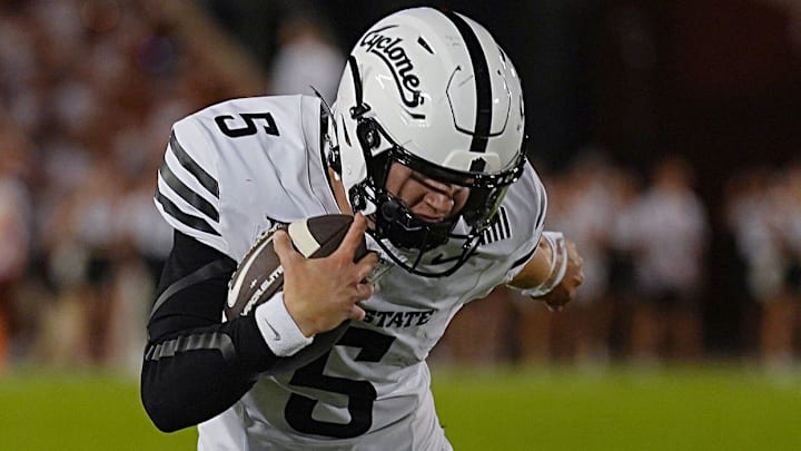 Iowa State Cyclones' quarterback Connor Moberly (5) breaks a tackle from Arizona Wildcats defensive back Marquis Groves-Killebrew (5) and runs for first down during the fourth quarter in the Big-12 conference showdown on Sept. 27, 2025, at Jack Trice Stadium in Ames, Iowa.