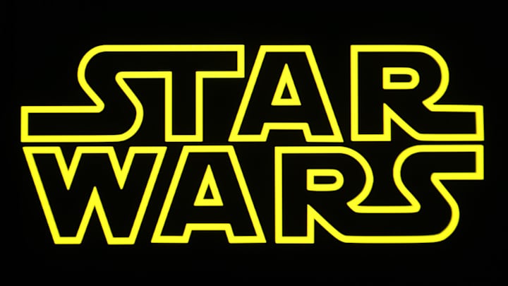 In this photo illustration, a Star Wars logo is seen on a...