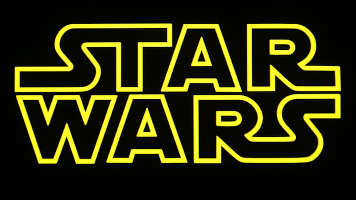 In this photo illustration, a Star Wars logo is seen on a...