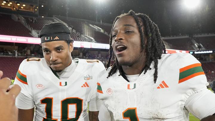 Sep 4, 2026; Stanford, California, USA; Miami Hurricanes quarterback Darian Mensah (10) and wide receiver Malachi Toney (1) on the field after defeating the Stanford Cardinal at Stanford Stadium. Mandatory Credit: Stan Szeto-Imagn Images Sep 4, 2026; Stanford, California, USA; Miami Hurricanes quarterback Darian Mensah (10) and wide receiver Malachi Toney (1) on the field after defeating the Stanford Cardinal at Stanford Stadium. Mandatory Credit: Stan Szeto-Imagn Images