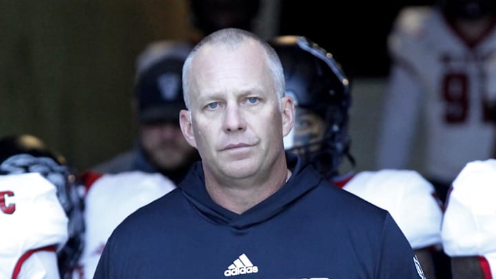 Nov 18, 2023; Blacksburg, Virginia, USA; North Carolina State Wolfpack head coach Dave Doeren walks to the field with his team before the game against the Virginia Tech Hokies at Lane Stadium. Mandatory Credit: Peter Casey-Imagn Images Nov 18, 2023; Blacksburg, Virginia, USA; North Carolina State Wolfpack head coach Dave Doeren walks to the field with his team before the game against the Virginia Tech Hokies at Lane Stadium. Mandatory Credit: Peter Casey-Imagn Images