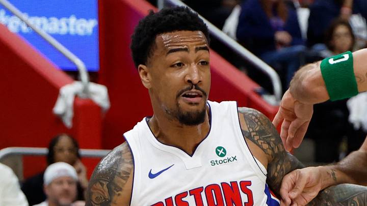 Oct 20, 2026; Detroit, Michigan, USA;  Detroit Pistons power forward John Collins (20) dribbles against Boston Celtics small forward Jayson Tatum (0) in the first half at Little Caesars Arena.  Mandatory Credit: Rick Osentoski-Imagn Images