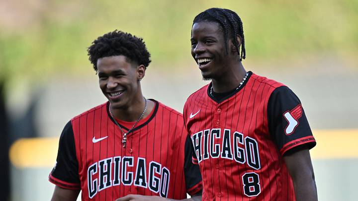 Jul 7, 2026; Chicago, Illinois, USA; Chicago Bulls 2026 NBA Draft first round picks Caleb Wilson, 4th, and Dailyn Swain, 15th, prior to a game between the Chicago White Sox and the Boston Red Sox at Rate Field. Mandatory Credit: Patrick Gorski-Imagn Images