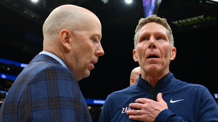 Dec 13, 2025; Seattle, Washington, USA; UCLA Bruins head coach Mick Cronin and Gonzaga Bulldogs head coach Mark Few after the game at Climate Pledge Arena. Mandatory Credit: Steven Bisig-Imagn Images