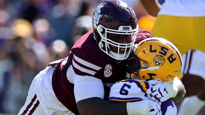 Mississippi State Bulldogs defensive line Kalvin Dinkins (35) takes down Louisiana State Tigers wide receiver Winston Watkins (6) during the second half at Tiger Stadium. Mississippi State Bulldogs defensive line Kalvin Dinkins (35) takes down Louisiana State Tigers wide receiver Winston Watkins (6) during the second half at Tiger Stadium.