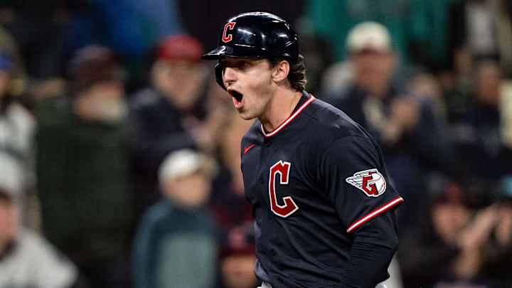 Mar 28, 2026; Seattle, Washington, USA; Cleveland Guardians designated hitter Chase DeLauter (24) celebrates while rounding the bases after hitting a two-run home run during the tenth inning against the Seattle Mariners at T-Mobile Park. Mandatory Credit: Stephen Brashear-Imagn Images