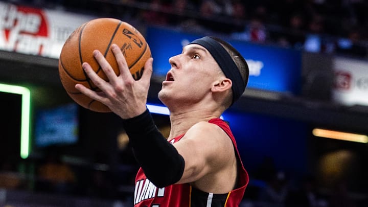Nov 17, 2024; Indianapolis, Indiana, USA; Miami Heat guard Tyler Herro (14) shoots the ball while Indiana Pacers center Myles Turner (33) defends in the second half at Gainbridge Fieldhouse. Mandatory Credit: Trevor Ruszkowski-Imagn Images Nov 17, 2024; Indianapolis, Indiana, USA; Miami Heat guard Tyler Herro (14) shoots the ball while Indiana Pacers center Myles Turner (33) defends in the second half at Gainbridge Fieldhouse. Mandatory Credit: Trevor Ruszkowski-Imagn Images