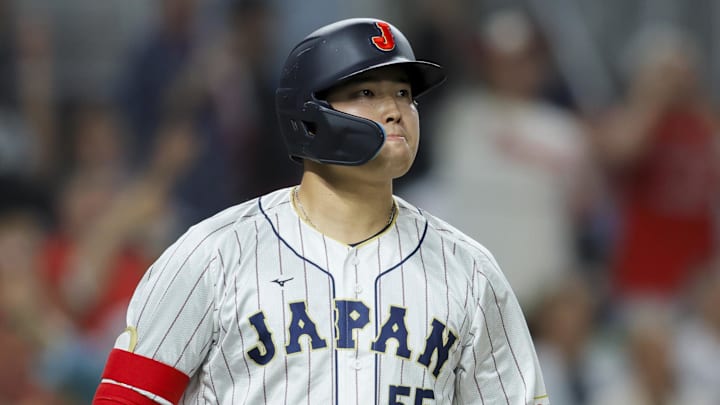 Mar 21, 2023; Miami, Florida, USA; Japan third baseman Munetaka Murakami (55) looks on after hitting a home run during the second inning against USA at LoanDepot Park. Mandatory Credit: Sam Navarro-Imagn Images