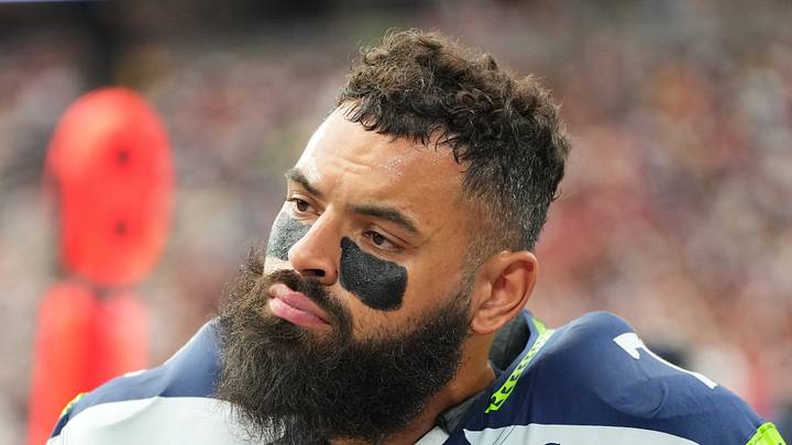 Seattle Seahawks offensive tackle Abraham Lucas looks on from the sideline