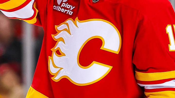 Jan 19, 2026; Calgary, Alberta, CAN; Calgary Flames center Yegor Sharangovich (17) against the New Jersey Devils during the second period at Scotiabank Saddledome. Mandatory Credit: Sergei Belski-Imagn Images