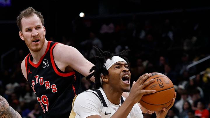 Washington Wizards guard Bilal Coulibaly is defended by Toronto Raptors centre Jakob Poeltl. Washington Wizards guard Bilal Coulibaly is defended by Toronto Raptors centre Jakob Poeltl.