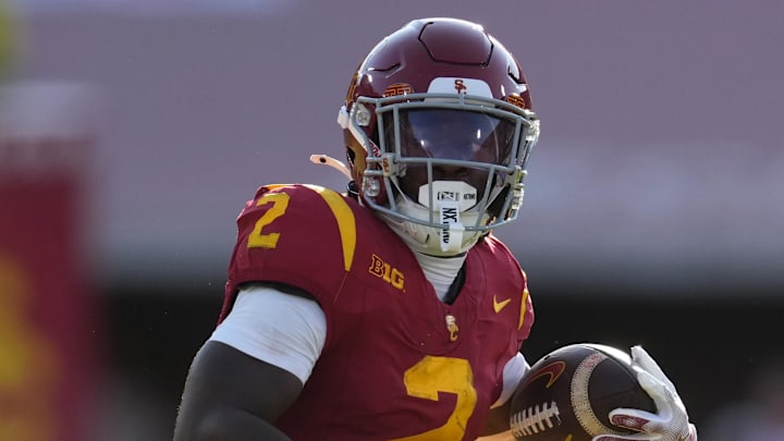 Aug 30, 2025; Los Angeles, California, USA; Southern California Trojans running back Waymond Jordan (2) carries the ball against the Missouri State Bears in the first half at United Airlines Field at Los Angeles Memorial Coliseum. Mandatory Credit: Kirby Lee-Imagn Images