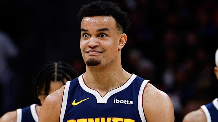 Jan 20, 2026; Denver, Colorado, USA; Denver Nuggets forward Spencer Jones (21) reacts after a play in the third quarter against the Los Angeles Lakers at Ball Arena. Mandatory Credit: Isaiah J. Downing-Imagn Images