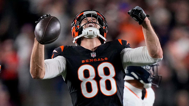 Cincinnati Bengals tight end Mike Gesicki celebrates scoring a first down.