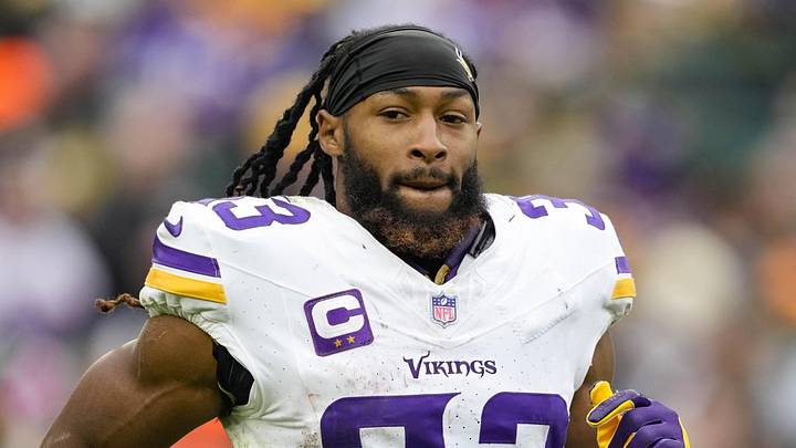 Nov 23, 2025; Green Bay, Wisconsin, USA;  Minnesota Vikings running back Aaron Jones Sr. (33) during the game against the Green Bay Packers at Lambeau Field. Mandatory Credit: Jeff Hanisch-Imagn Images
