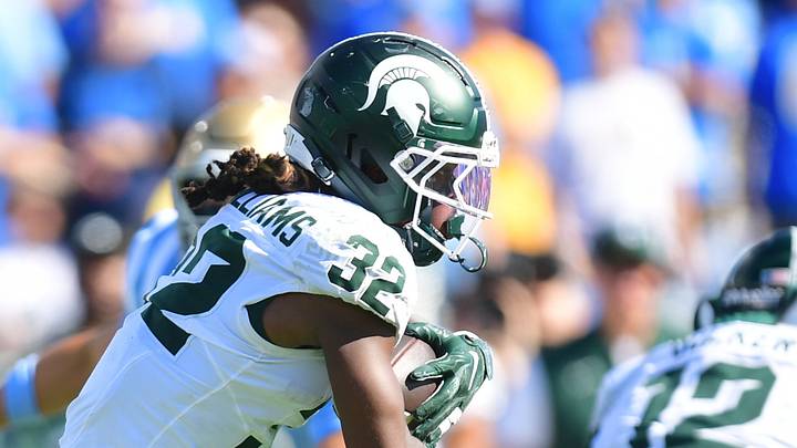 Oct 24, 2026; Pasadena, California, USA; Michigan State Spartans running back Kenneth Williams (32) carries the ball during the first half against the UCLA Bruins at Rose Bowl. Mandatory Credit: Gary A. Vasquez-Imagn Images Oct 24, 2026; Pasadena, California, USA; Michigan State Spartans running back Kenneth Williams (32) carries the ball during the first half against the UCLA Bruins at Rose Bowl. Mandatory Credit: Gary A. Vasquez-Imagn Images