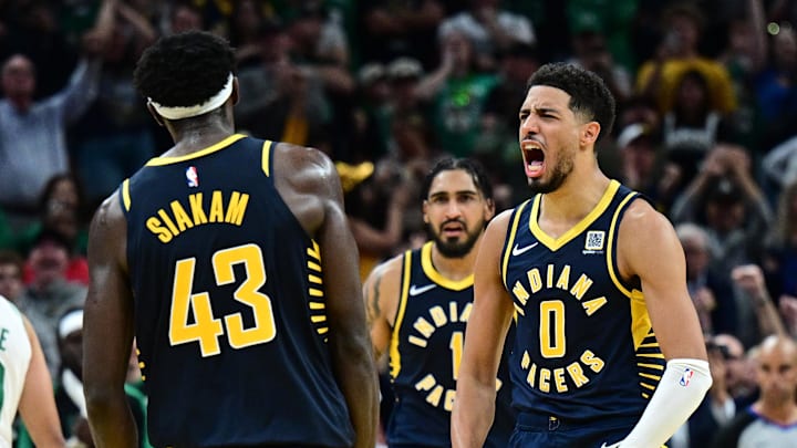 Oct 30, 2024; Indianapolis, Indiana, USA; Indiana Pacers guard Tyrese Haliburton (0) reacts to forward Pascal Siakam (43) making a three point shot to win the game against the Boston Celtics at Gainbridge Fieldhouse. Mandatory Credit: Marc Lebryk-Imagn Images