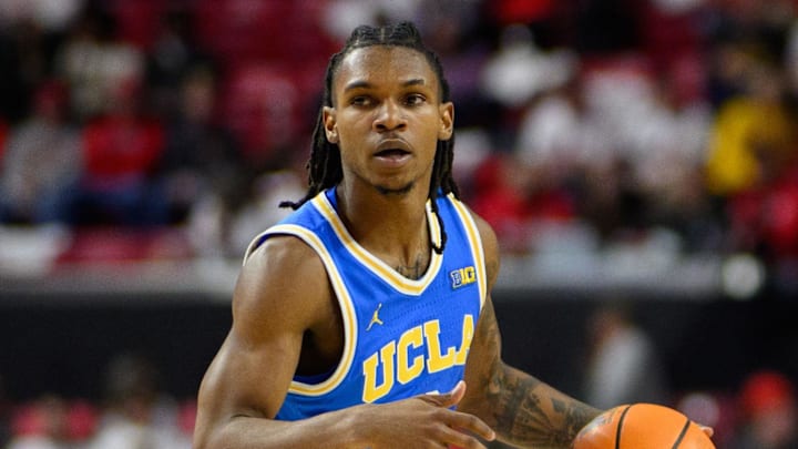 Jan 10, 2025; College Park, Maryland, USA; UCLA Bruins guard Dylan Andrews (2) handles the ball against Maryland Terrapins guard Rodney Rice (1) during the first half at Xfinity Center. Mandatory Credit: Reggie Hildred-Imagn Images Jan 10, 2025; College Park, Maryland, USA; UCLA Bruins guard Dylan Andrews (2) handles the ball against Maryland Terrapins guard Rodney Rice (1) during the first half at Xfinity Center. Mandatory Credit: Reggie Hildred-Imagn Images