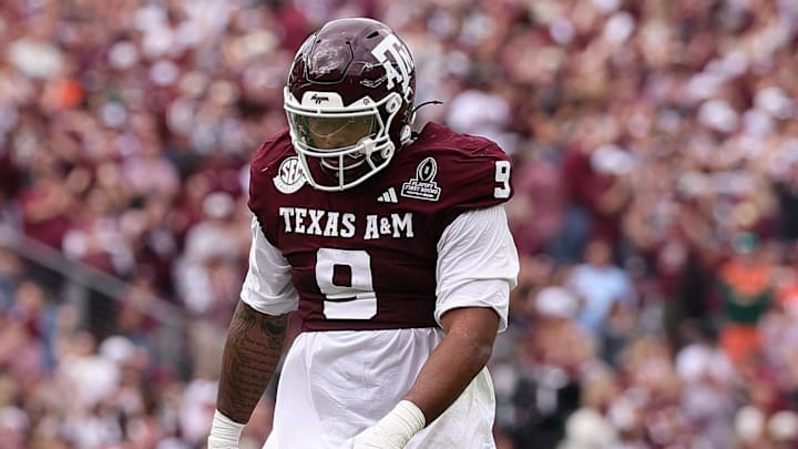 Dec 20, 2025; College Station, TX, USA; Texas A&M Aggies defensive end Cashius Howell (9) reacts during first half of the first round game of the CFP National Playoff against the Miami Hurricanes at Kyle Field. Mandatory Credit: Maria Lysaker-Imagn Images