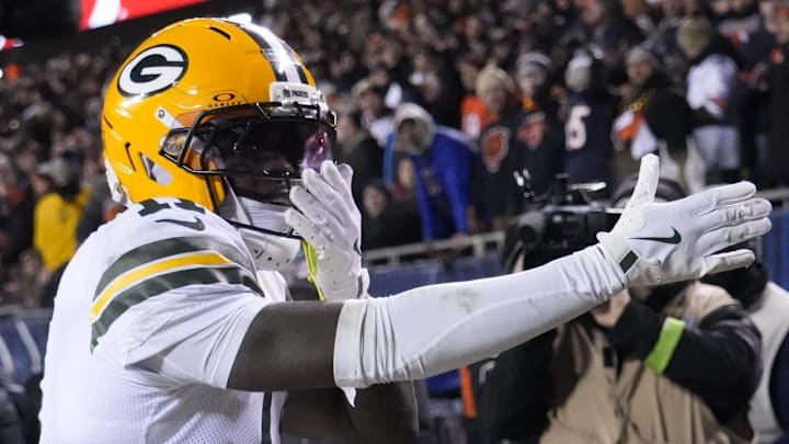 Green Bay Packers receiver Jayden Reed reacts after scoring touchdown against the Chicago Bears during their playoff game.