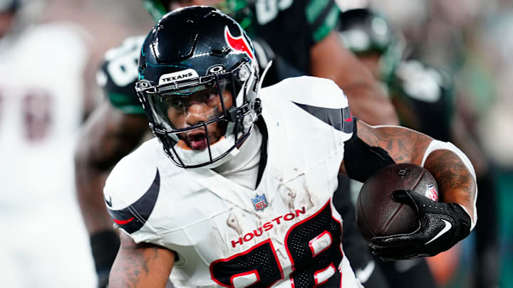 Houston Texans running back Joe Mixon (28) is shown with the ball during the first quarter, Thursday, October 31, 2024, in East Rutherford.