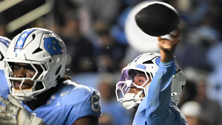 Nov 8, 2025; Chapel Hill, North Carolina, USA;  North Carolina Tar Heels quarterback Gio Lopez (7) passes in the third quarter at Kenan Stadium. Mandatory Credit: Bob Donnan-Imagn Images