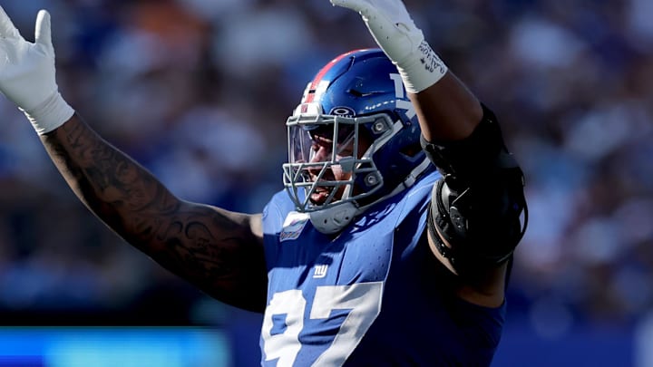 Sep 28, 2025; East Rutherford, New Jersey, USA; New York Giants defensive tackle Dexter Lawrence (97) reacts during the fourth quarter against the Los Angeles Chargers at MetLife Stadium. Sep 28, 2025; East Rutherford, New Jersey, USA; New York Giants defensive tackle Dexter Lawrence (97) reacts during the fourth quarter against the Los Angeles Chargers at MetLife Stadium.