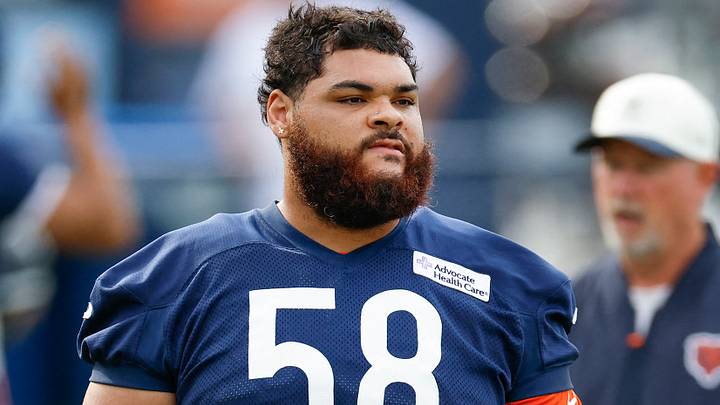 Jul 31, 2026; Lake Forest, IL, USA; Chicago Bears offensive tackle Darnell Wright (58) walks on he field during Training Camp at Halas Hall. Mandatory Credit: Kamil Krzaczynski-Imagn Images