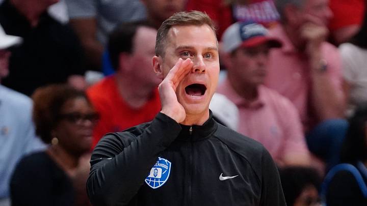 Duke Blue Devils head coach Jon Scheyer yells out during the exhibition game against Kansas Jayhawks inside Allen Fieldhouse in Lawrence, Kansas on Oct. 25, 2026.