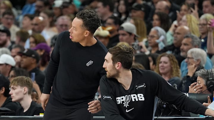 Mar 19, 2026; San Antonio, Texas, USA; San Antonio Spurs head coach Mitch Johnson talks with center Luke Kornet (7) in the first half against the Phoenix Suns at Frost Bank Center. Mandatory Credit: Daniel Dunn-Imagn Images Mar 19, 2026; San Antonio, Texas, USA; San Antonio Spurs head coach Mitch Johnson talks with center Luke Kornet (7) in the first half against the Phoenix Suns at Frost Bank Center. Mandatory Credit: Daniel Dunn-Imagn Images