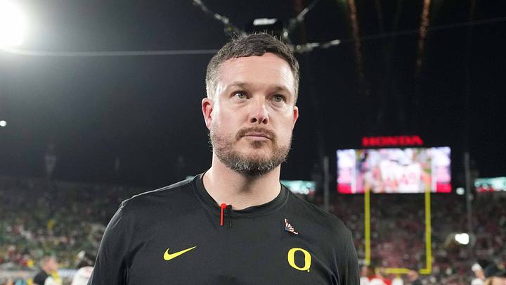 Jan 1, 2025; Pasadena, CA, USA; Oregon Ducks head coach Dan Lanning leaves the field after a CFP Quarterfinal against the Ohio State Buckeyes at Rose Bowl Stadium. Mandatory Credit: Kirby Lee-Imagn Images Jan 1, 2025; Pasadena, CA, USA; Oregon Ducks head coach Dan Lanning leaves the field after a CFP Quarterfinal against the Ohio State Buckeyes at Rose Bowl Stadium. Mandatory Credit: Kirby Lee-Imagn Images