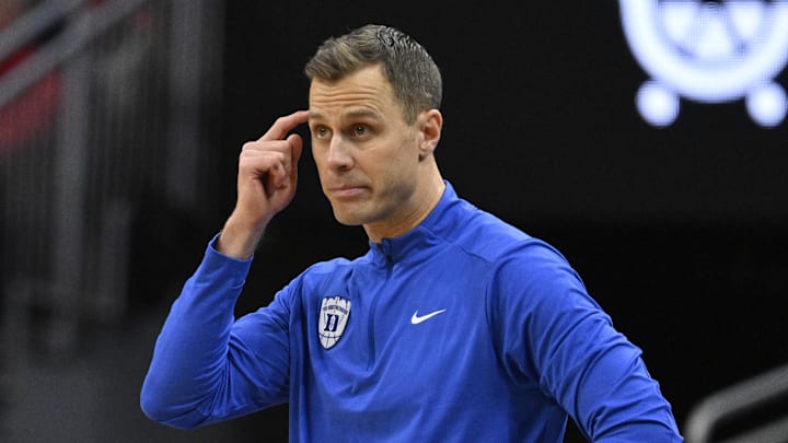 Jan 6, 2026; Louisville, Kentucky, USA; Duke Blue Devils head coach Jon Scheyer reacts during the second half against the Louisville Cardinals at KFC Yum! Center. Duke defeated Louisville 84-73. Mandatory Credit: Jamie Rhodes-Imagn Images Jan 6, 2026; Louisville, Kentucky, USA; Duke Blue Devils head coach Jon Scheyer reacts during the second half against the Louisville Cardinals at KFC Yum! Center. Duke defeated Louisville 84-73. Mandatory Credit: Jamie Rhodes-Imagn Images