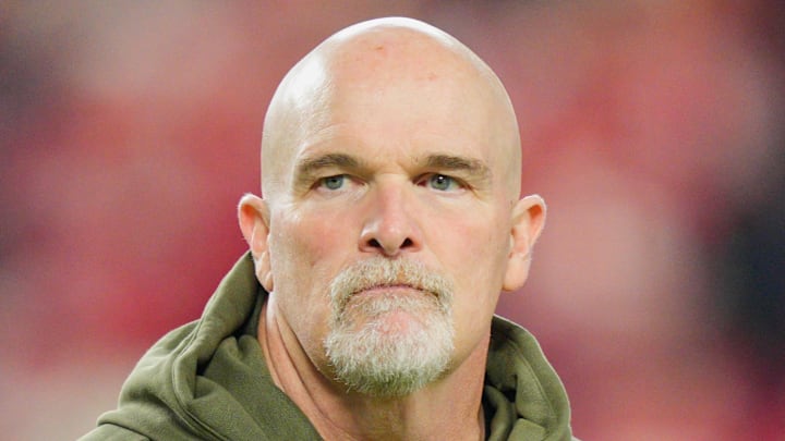 Washington Commanders head coach Dan Quinn looks on during warmups prior to the game against the Kansas City Chiefs. Washington Commanders head coach Dan Quinn looks on during warmups prior to the game against the Kansas City Chiefs.
