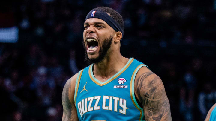 Apr 7, 2024; Charlotte, North Carolina, USA; Charlotte Hornets forward Miles Bridges (0) celebrates after scoring against the Oklahoma City Thunder during the fourth quarter at Spectrum Center. Mandatory Credit: Scott Kinser-USA TODAY Sports