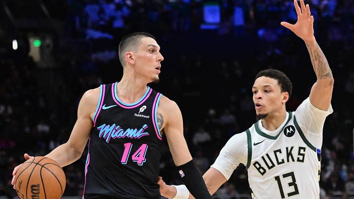 Feb 24, 2026; Milwaukee, Wisconsin, USA; Miami Heat guard Tyler Herro (14) looks for a shot against Milwaukee Bucks guard Ryan Rollins (13) in the fourth quarter at Fiserv Forum. Mandatory Credit: Benny Sieu-Imagn Images Feb 24, 2026; Milwaukee, Wisconsin, USA; Miami Heat guard Tyler Herro (14) looks for a shot against Milwaukee Bucks guard Ryan Rollins (13) in the fourth quarter at Fiserv Forum. Mandatory Credit: Benny Sieu-Imagn Images