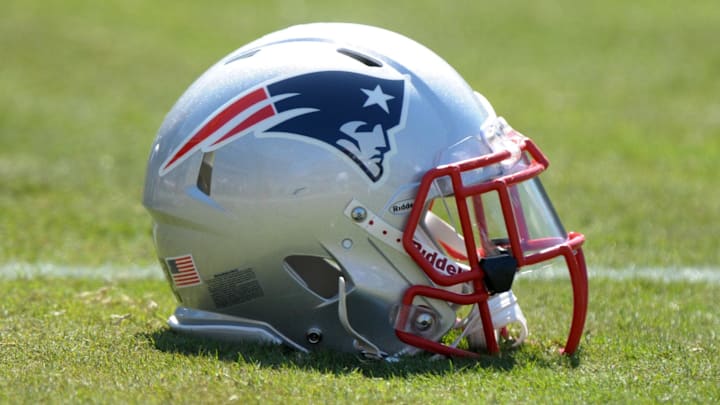 Oct 2, 2011; Oakland, CA, USA; General view of a New England Patriots helmet on the field during the game against the Oakland Raiders at the O.co Coliseum. Mandatory Credit: Kirby Lee/Image of Sport-Imagn Images Oct 2, 2011; Oakland, CA, USA; General view of a New England Patriots helmet on the field during the game against the Oakland Raiders at the O.co Coliseum. Mandatory Credit: Kirby Lee/Image of Sport-Imagn Images