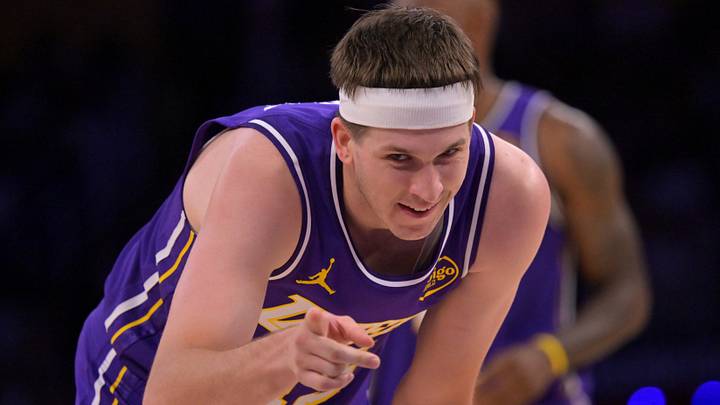 Feb 5, 2026; Los Angeles, California, USA;  Los Angeles Lakers guard Austin Reaves (15) reacts after a foul in the second half against the Philadelphia 76ers at Crypto.com Arena. Mandatory Credit: Jayne Kamin-Oncea-Imagn Images