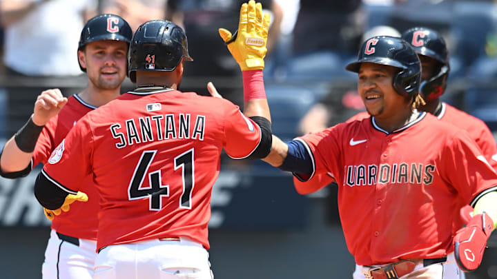 Jun 11, 2025; Cleveland, Ohio, USA; Cleveland Guardians first baseman Carlos Santana (41) celebrates with third baseman Jose Ramirez (11) and center fielder Lane Thomas (8) and second baseman Angel Martinez (1) after hitting a grand slam home run during the third inning against the Cincinnati Reds at Progressive Field. Mandatory Credit: Ken Blaze-Imagn Images