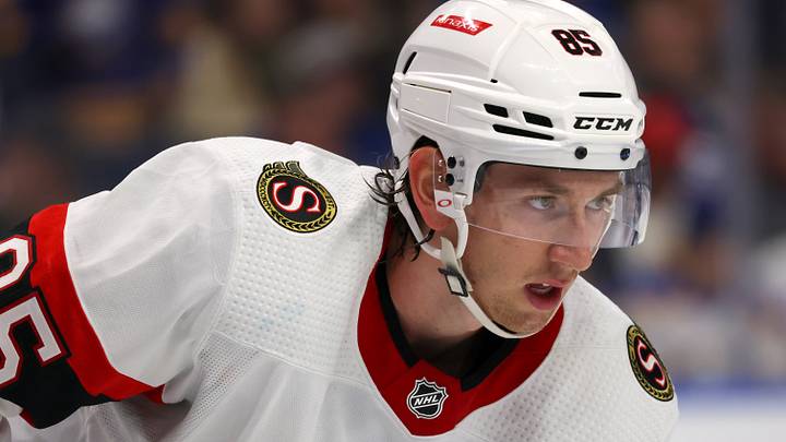 Oct 13, 2022; Buffalo, New York, USA; Ottawa Senators defenseman Jake Sanderson (85) waits for the face-off during the second period against the Buffalo Sabres at KeyBank Center. Mandatory Credit: Timothy T. Ludwig-USA TODAY Sports Oct 13, 2022; Buffalo, New York, USA; Ottawa Senators defenseman Jake Sanderson (85) waits for the face-off during the second period against the Buffalo Sabres at KeyBank Center. Mandatory Credit: Timothy T. Ludwig-USA TODAY Sports