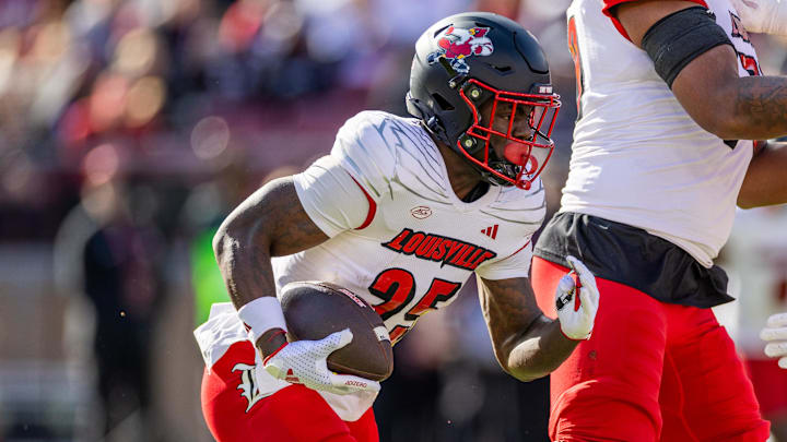 Nov 16, 2024; Stanford, California, USA;  Louisville Cardinals running back Isaac Brown (25) runs the ball during the first quarter against the Stanford Cardinal at Stanford Stadium. 