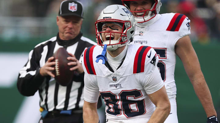 Dec 28, 2025; East Rutherford, New Jersey, USA; New England Patriots wide receiver Efton Chism III (86) celebrates after a catch against the New York Jets during the first quarter of the game at MetLife Stadium. Mandatory Credit: Vincent Carchietta-Imagn Images