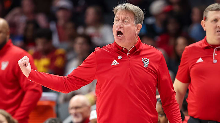 Nov 9, 2025; Charlotte, North Carolina, USA; NC State Wolfpack head coach Wes Moore in action against the Southern California Trojans during the fourth quarter of the Ally Tipoff game at Spectrum Center. Mandatory Credit: Cory Knowlton-Imagn Images Nov 9, 2025; Charlotte, North Carolina, USA; NC State Wolfpack head coach Wes Moore in action against the Southern California Trojans during the fourth quarter of the Ally Tipoff game at Spectrum Center. Mandatory Credit: Cory Knowlton-Imagn Images