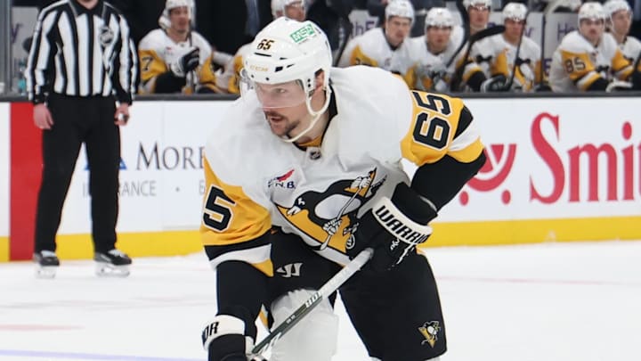 Mar 14, 2026; Salt Lake City, Utah, USA; Pittsburgh Penguins defenseman Erik Karlsson (65) skates with the puck against Utah Mammoth right wing JJ Peterka (77) during the first period at Delta Center. Mandatory Credit: Rob Gray-Imagn Images Mar 14, 2026; Salt Lake City, Utah, USA; Pittsburgh Penguins defenseman Erik Karlsson (65) skates with the puck against Utah Mammoth right wing JJ Peterka (77) during the first period at Delta Center. Mandatory Credit: Rob Gray-Imagn Images