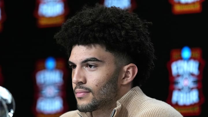 Apr 4, 2026; Indianapolis, IN, USA; Duke Blue Devils forward Cameron Boozer is awarded the Oscar Robertson Player of the Year Award presented by the US Basketball Writers Association and the Associated Press during the men's 2026 NCAA Tournament at Lucas Oil Stadium. Mandatory Credit: Bob Donnan-Imagn Images