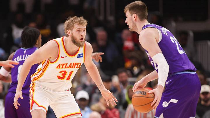 Feb 5, 2026; Atlanta, Georgia, USA; Atlanta Hawks center Jock Landale (31) defends Utah Jazz forward Kyle Filipowski (22) in the first quarter at State Farm Arena. Mandatory Credit: Brett Davis-Imagn Images
