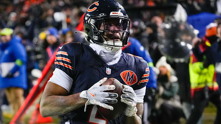 Jan 10, 2026; Chicago, IL, USA; Chicago Bears wide receiver DJ Moore (2) makes the eventual game-winning touchdown catch against the Green Bay Packers during the second half of an NFC Wild Card Round game at Soldier Field. Jan 10, 2026; Chicago, IL, USA; Chicago Bears wide receiver DJ Moore (2) makes the eventual game-winning touchdown catch against the Green Bay Packers during the second half of an NFC Wild Card Round game at Soldier Field.