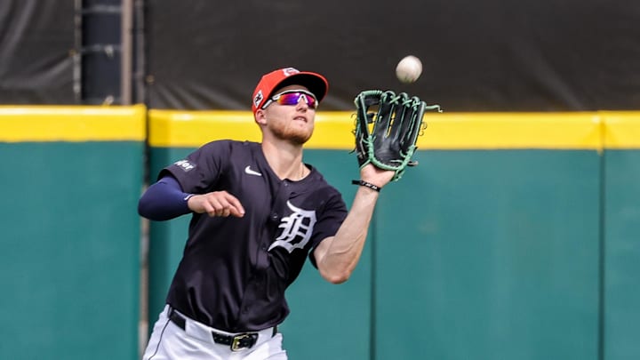 Feb 22, 2025; Lakeland, Florida, USA; Detroit Tigers outfielder Parker Meadows (22) catches a fly ball during the second inning against the Philadelphia Phillies at Publix Field at Joker Marchant Stadium.