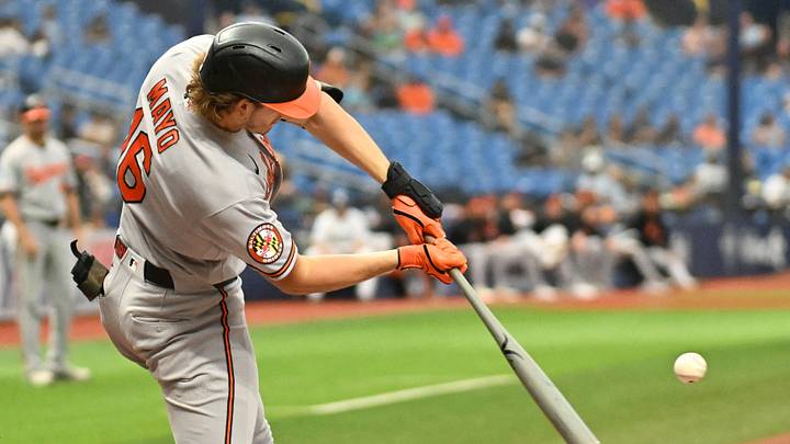 Aug 17, 2026; St. Petersburg, Florida, USA; Baltimore Orioles first baseman Coby Mayo (16) hits a solo home run in the second inning against the Tampa Bay Rays at Tropicana Field. Mandatory Credit: Jonathan Dyer-Imagn Images